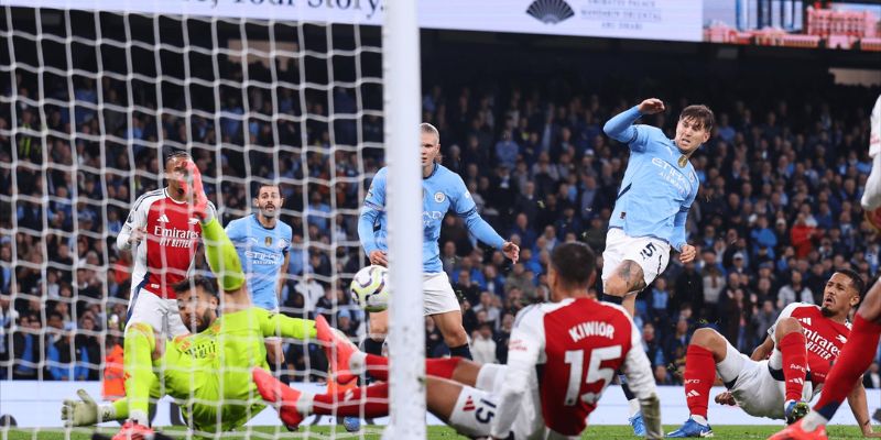 Man City hòa Arsenal trong một trận đấu đầy tính điên rồ